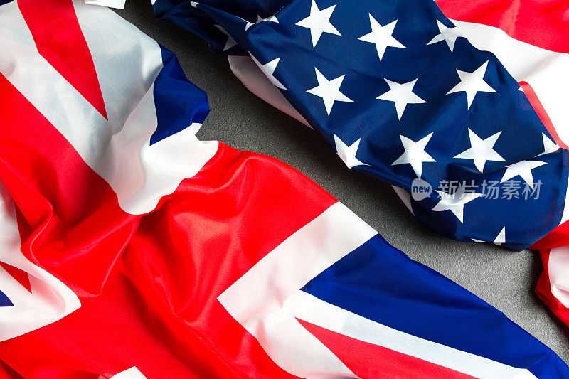UK flag and USA Flag на stone background . Relations between countries .The view from the top.
